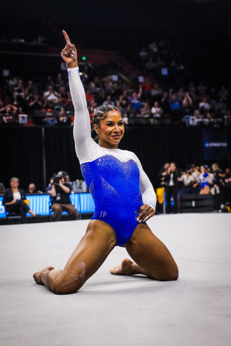 Jordan Chiles finishes her floor routine on her knees.