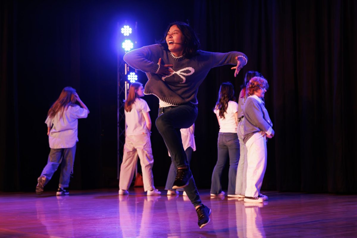 People dance on stage.