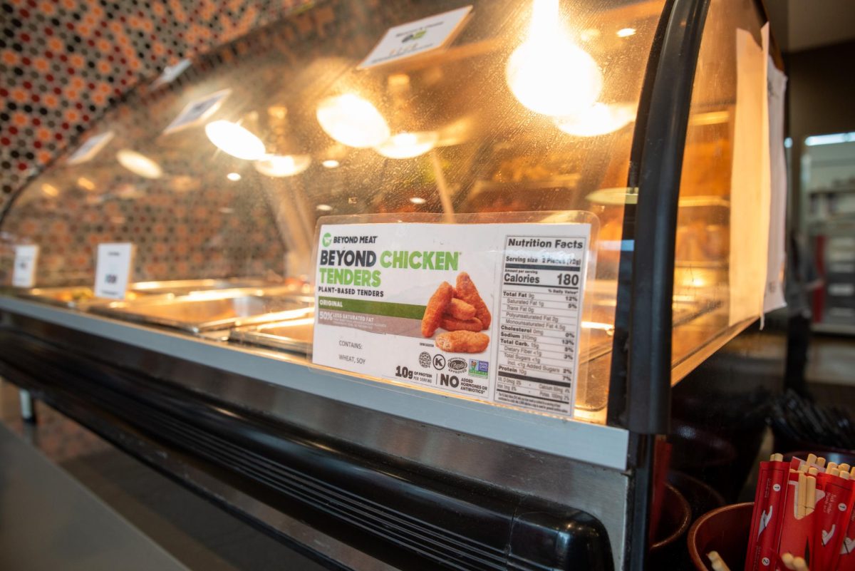 A hot food case with beyond chicken tenders.