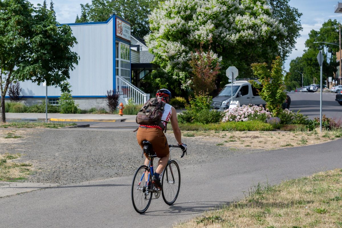 A biker passes by the Corvallis Skate Park on June 18. The path leading from the skate park to
Riverfront Park will be closed off to cars for the annual Open Streets Corvallis Festival on June
28.