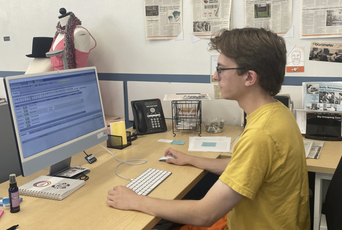 Sports Editor Ethan Browning enters hours on EmpCenter time sheet. Beginning July 6, all OSU employees will log time through Workday instead of EmpCenter.