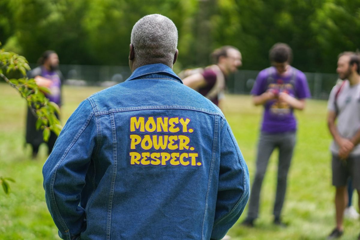 Statewide President of the Service Employees International Union (SEIU), Johnny Earl, stands in McNary Field sporting a statement jean jacket on June 30, 2026. Over 70,000 workers are represented under the SEIU Local 503, a branch that represents public sector and higher education employees, including classified staff at Oregon State University.