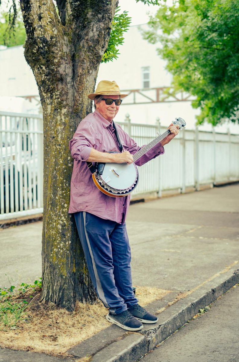 A man plays the banjo